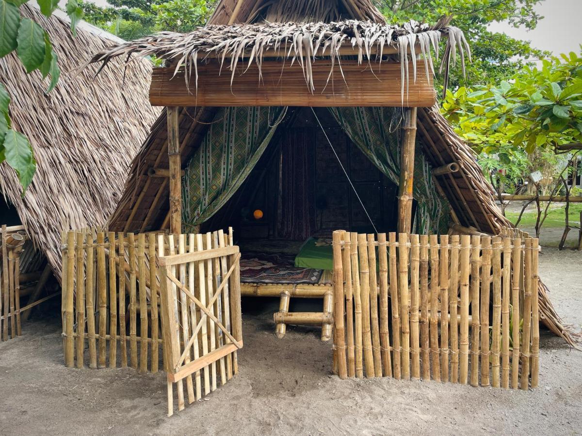A Pousada Tribal Huts Community Daanbantayan Quarto foto