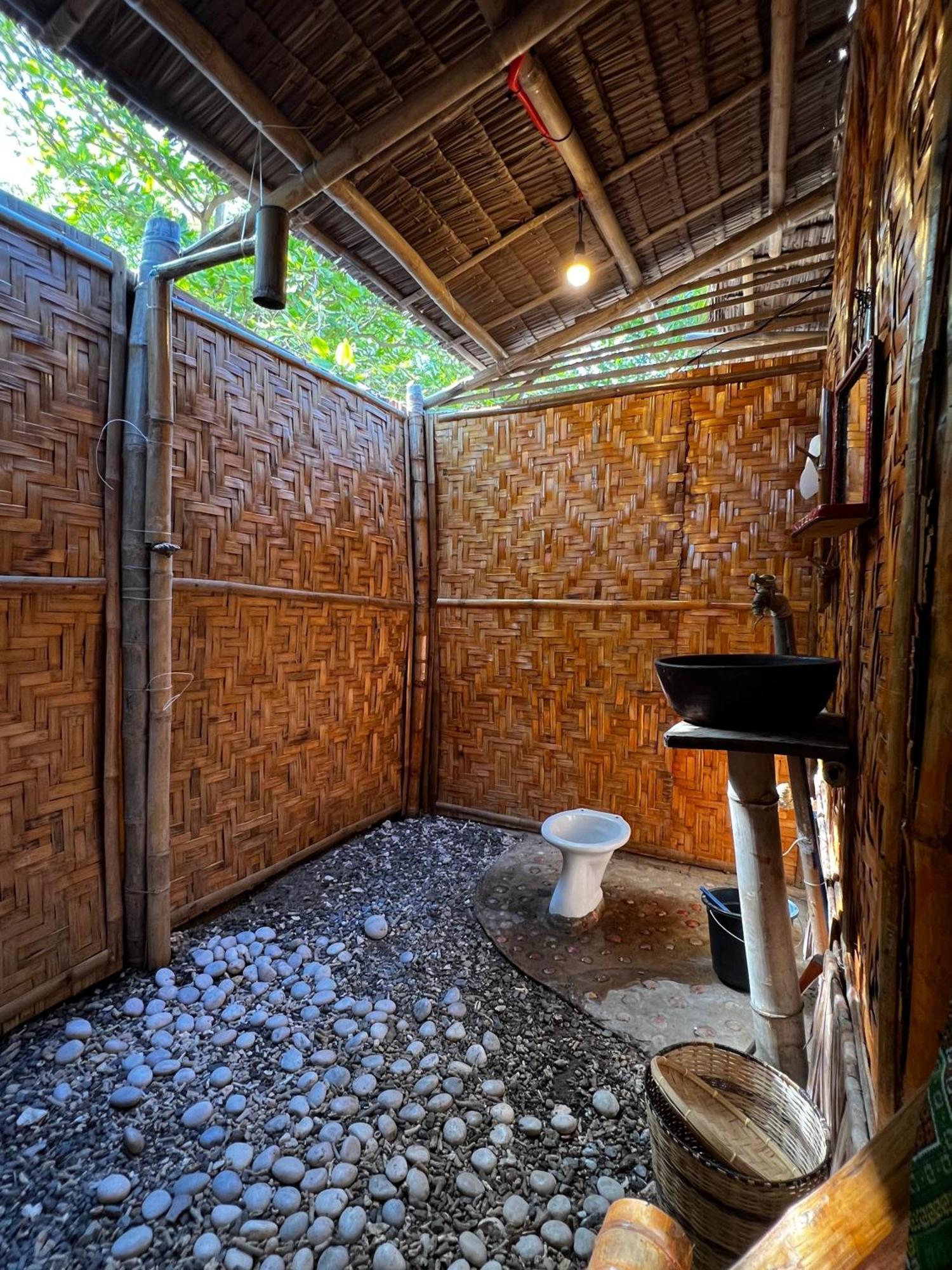 A Pousada Tribal Huts Community Daanbantayan Quarto foto