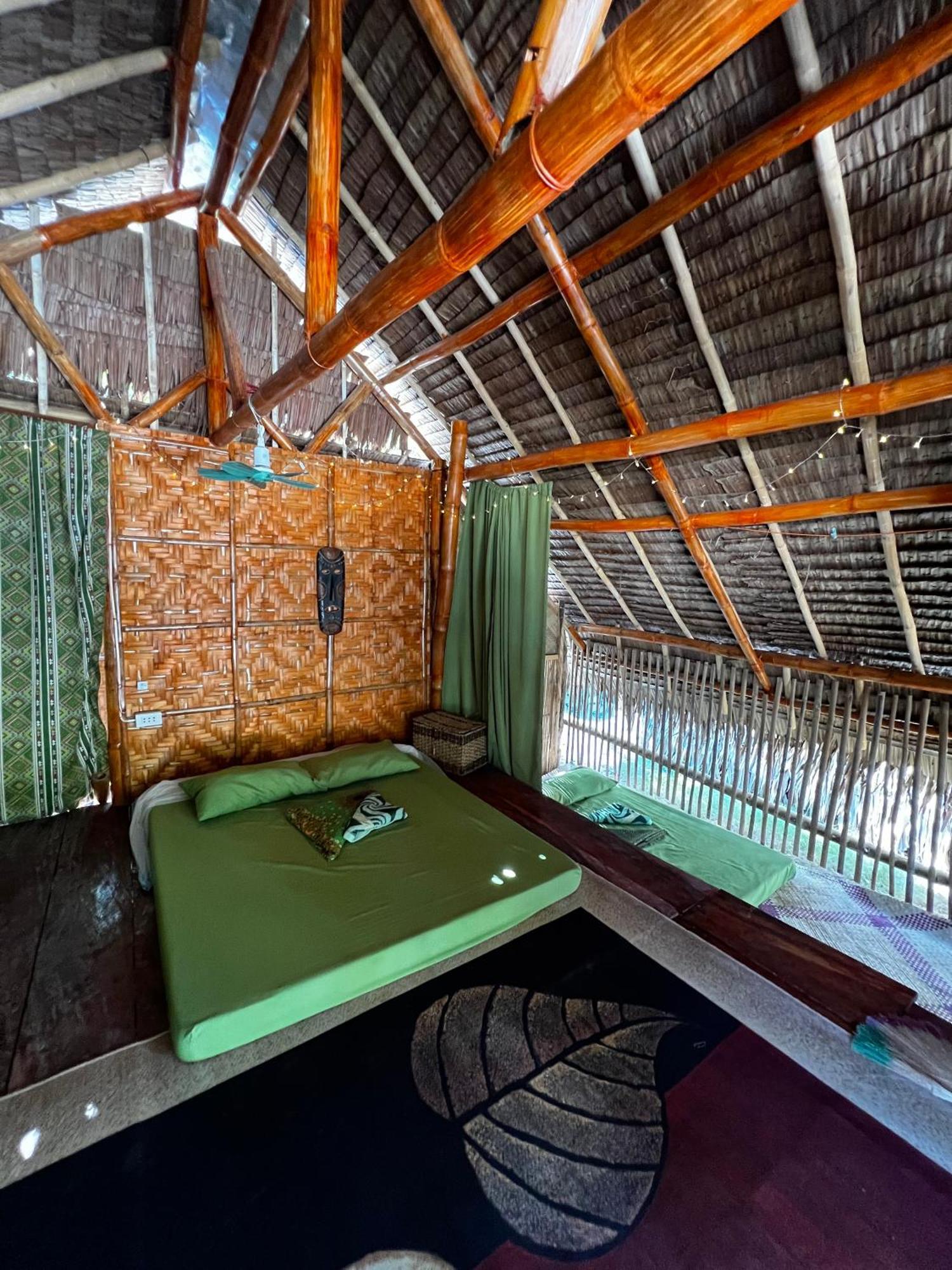 A Pousada Tribal Huts Community Daanbantayan Quarto foto