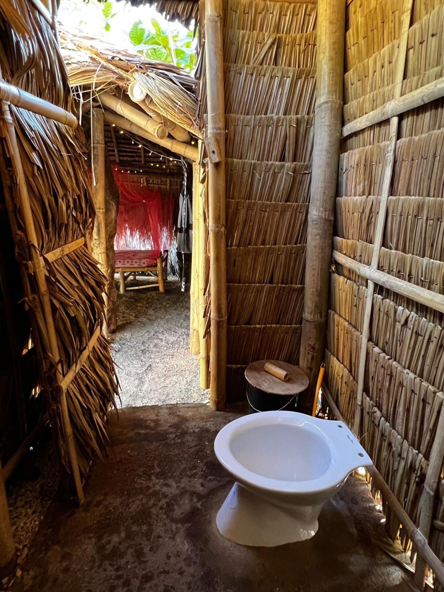 A Pousada Tribal Huts Community Daanbantayan Quarto foto