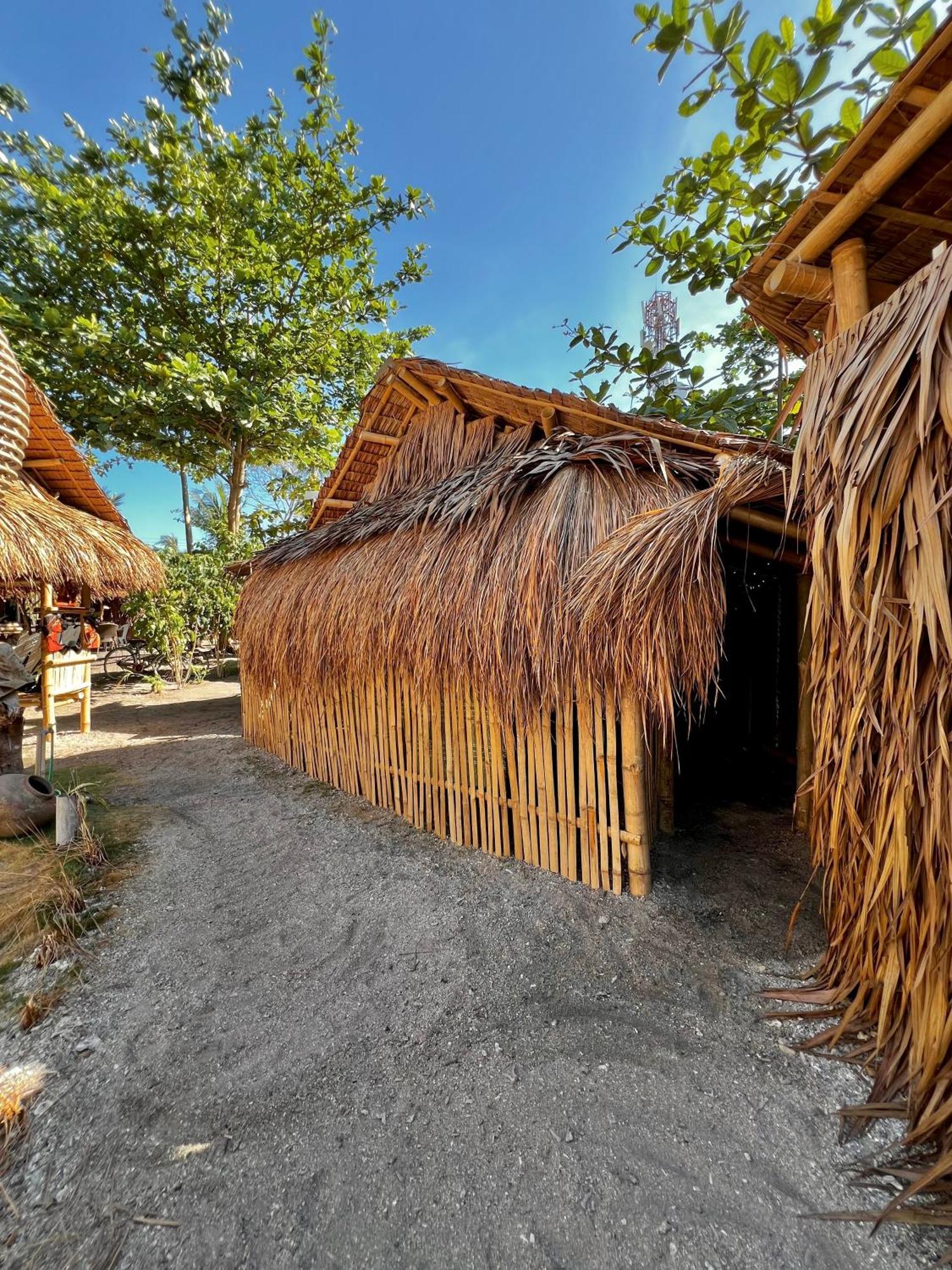 A Pousada Tribal Huts Community Daanbantayan Exterior foto