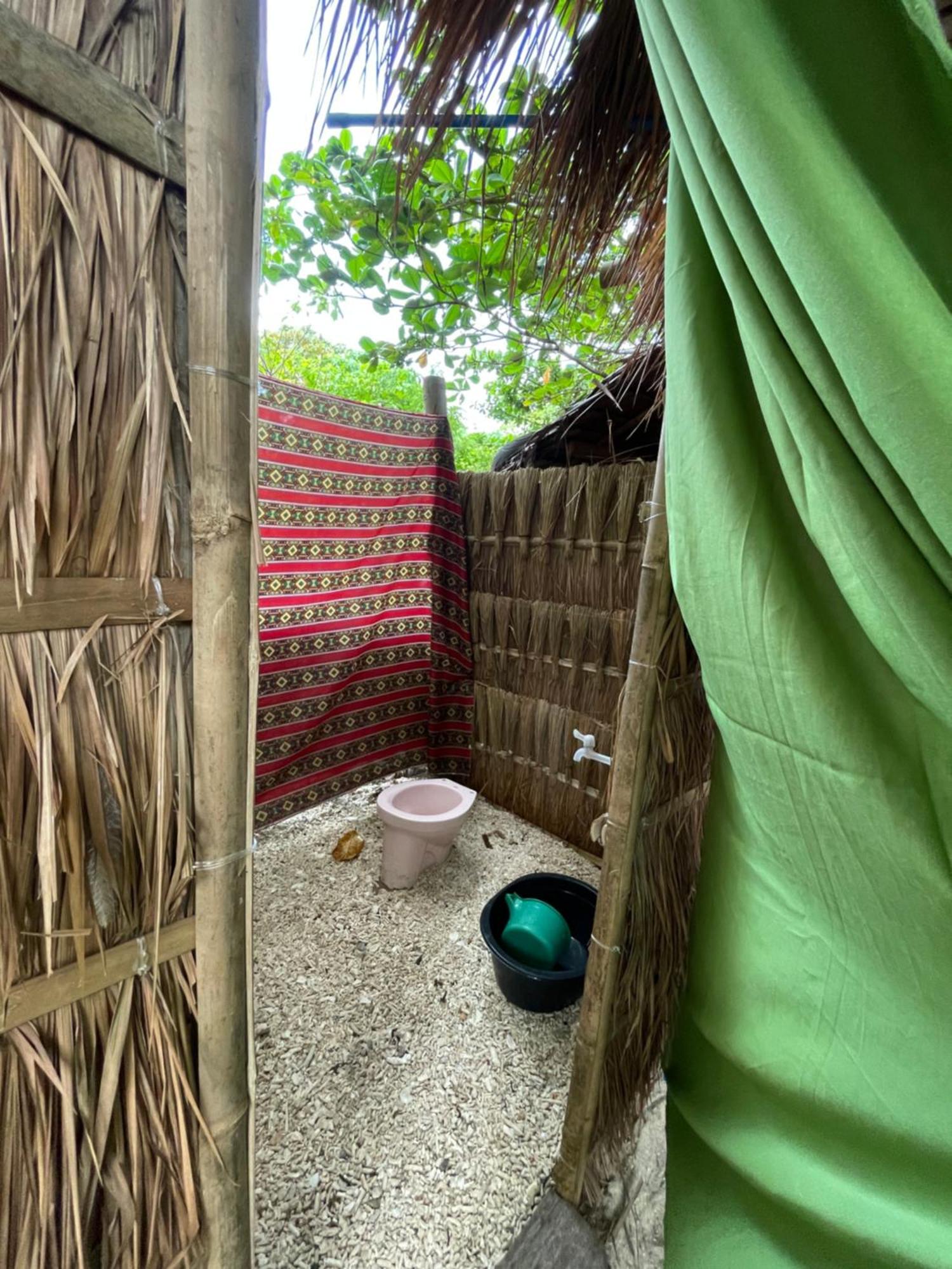 A Pousada Tribal Huts Community Daanbantayan Quarto foto
